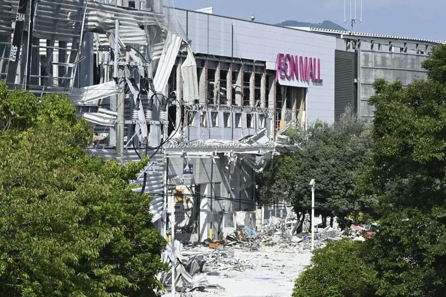 Erdbebenopfer in Japan sollten vor tödlicher Explosion für Bargeld ins Einkaufszentrum zurückkehren